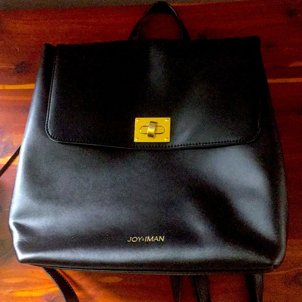 Joy and Iman black leather knapsack style purse